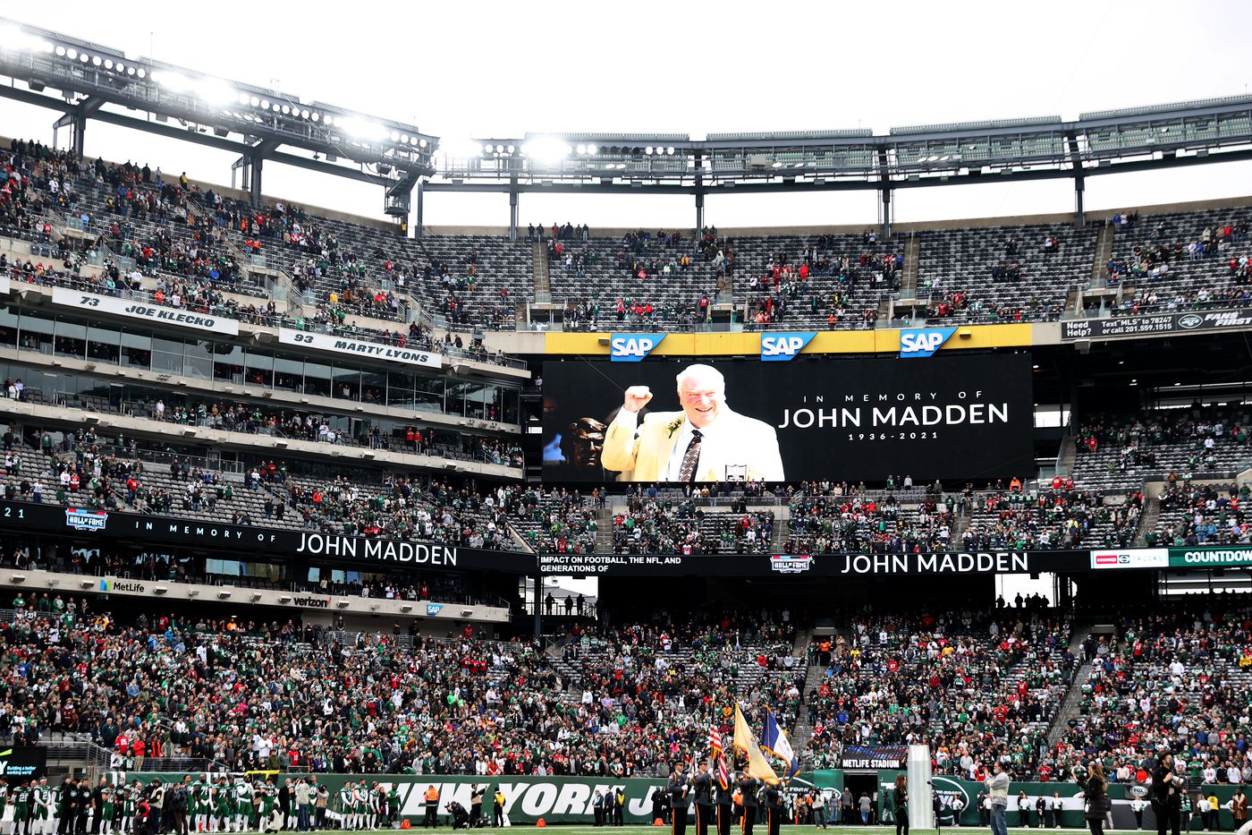 In Memory of John Madden sign in a stadium.
